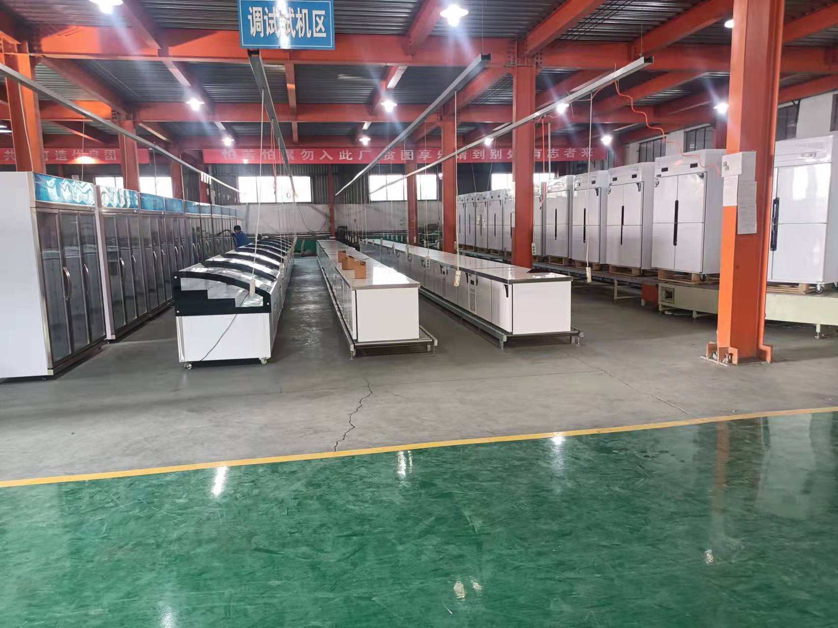 Yichuhui factory team working on commercial refrigeration equipment
